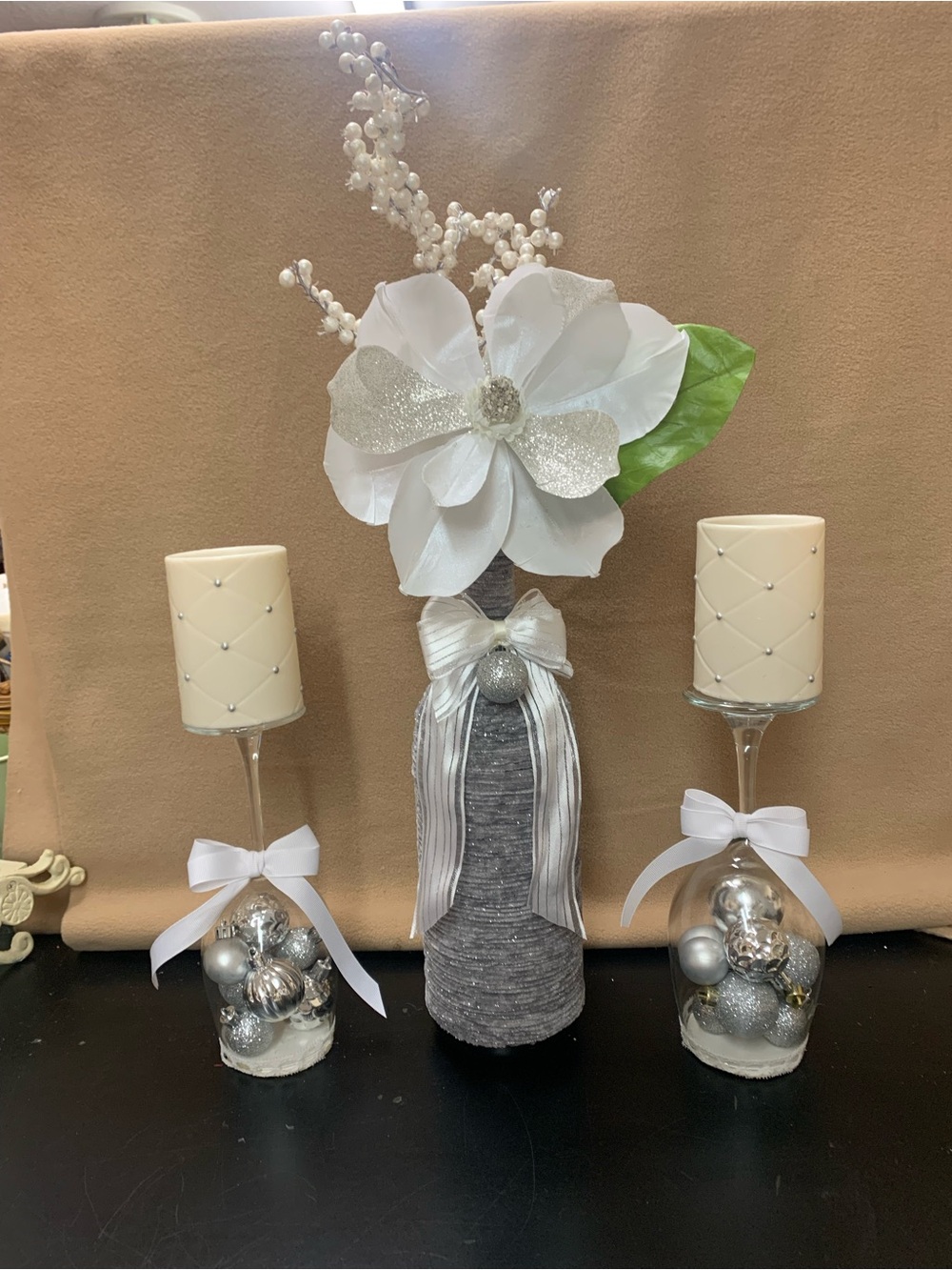 Elegant White and Silver Floral Bottle Centerpiece with Candle Holders